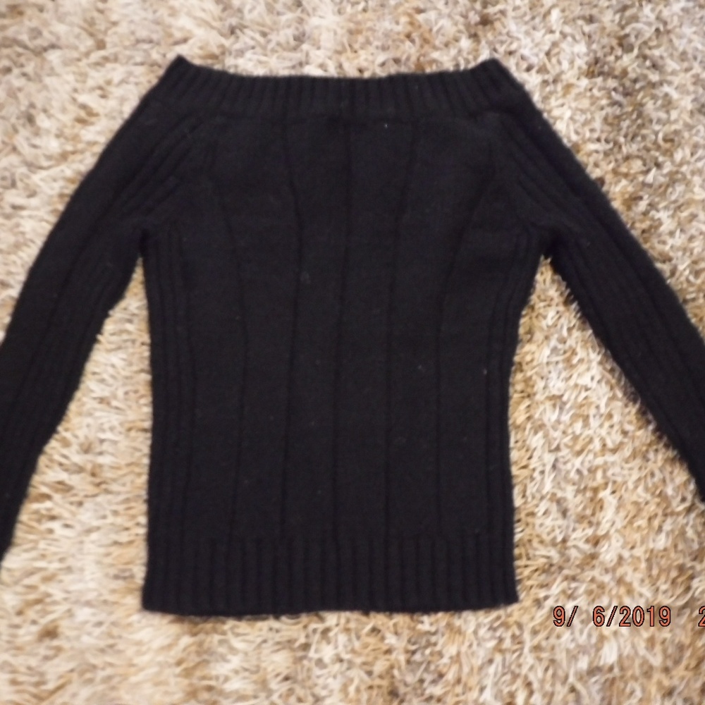 Black "fuzzy" long sleeved sweater,